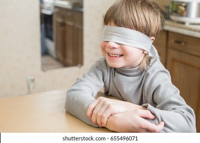 The Child Was Blindfolded At Home