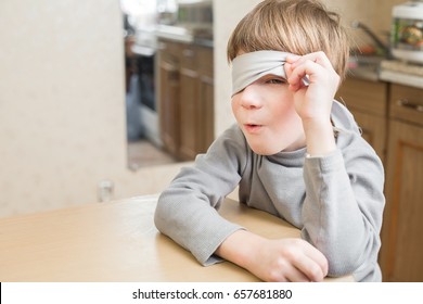 The Child Was Blindfolded At Home