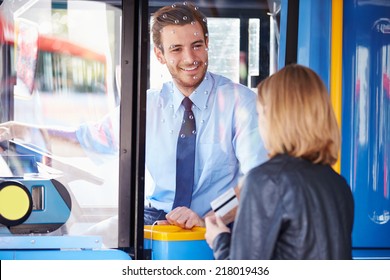 Child Boarding Bus And Using Pass