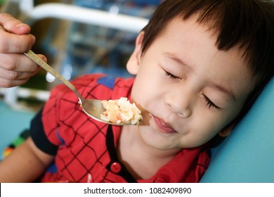 child bored with food