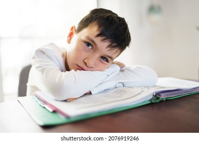 The Child Bored And Frustrated And Fed Up Doing His Homework