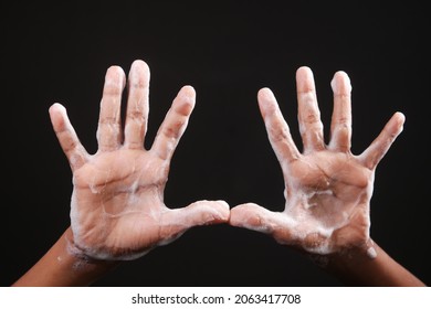  Child Boxy Washing Hands With Soap Isolated On Black 