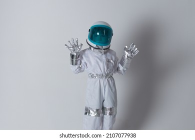 Child Boy Imagines Himself To Be An Astronaut In An Space Helmet. Success, Creative And Start Up Concept.