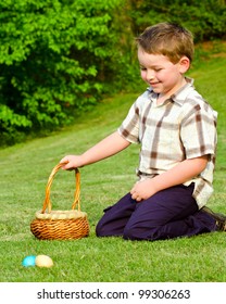 Child Boy Kid Collecting Colorful Easter Eggs During Hunt