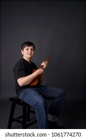 Child, Boy Learning The Ukelele