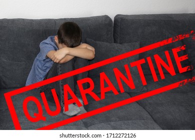 Child, Boy Sitting On A Gray Sofa In The Room, Clasping His Knees With His Hands And Covering His Face, The Concept Of Bad Mood And Education