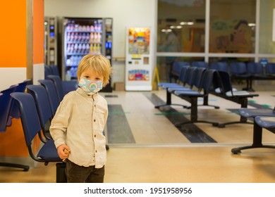 Child, Boy, Sitting In The Waiting Room In Emergency, Waiting For Examination And Xrays