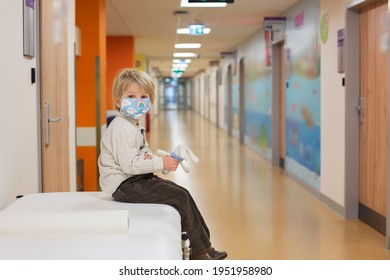 Child, Boy, Sitting In The Waiting Room In Emergency, Waiting For Examination And Xrays