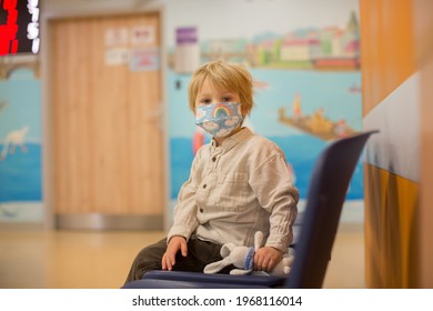 Child, Boy, Sitting In The Waiting Room In Emergency, Waiting For Examination And Xrays