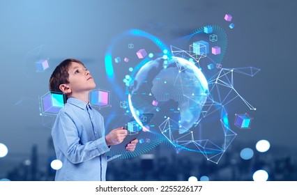 Child boy with tablet in hands looking up at earth sphere hud, web lines hologram and floating colorful big data cubes. Concept of metaverse and education - Powered by Shutterstock