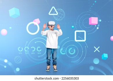 Child boy in vr glasses with open mouth, hands touching metaverse digital hud hologram with geometric figures, statistics and indicators. Concept of virtual reality - Shutterstock ID 2256035303