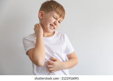 Child boy in white t-shirt scratching his body. Scabies, skin disease rash. Isolated on white background  - Powered by Shutterstock