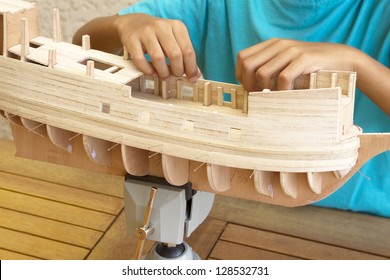 Child Building A N Historic Model Ship