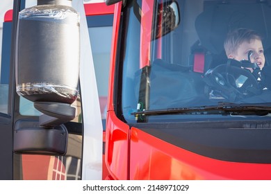 A Child In The Cab Of A Fire Truck. Moscow. 16.04.2022