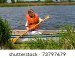 child in canoe