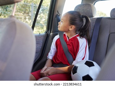 Child In Car Interior, Travel Transport To Football And Soccer Athlete Sitting In Motor Vehicle. Young Sports Athlete In Brazil Fitness Training, Journey To Game In Back Seat And Kid Safety Seat Belt