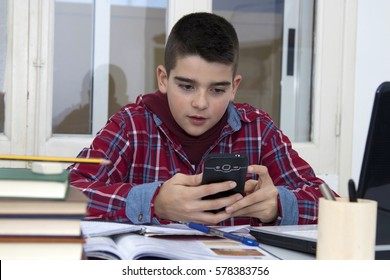 child with the cellphone at school