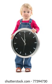 Child with clock indicant at the eleventh hour, on white background.
