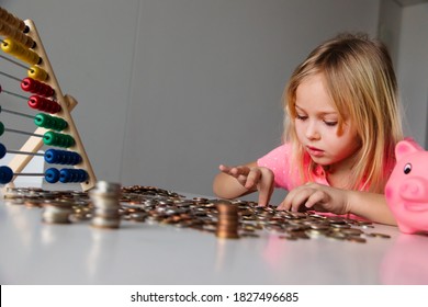 Child Counting Coins, Cute Girl Saving Money