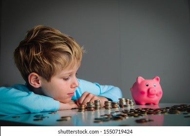 Child Counting Money, Boy Put Coins Into Piggy Bank