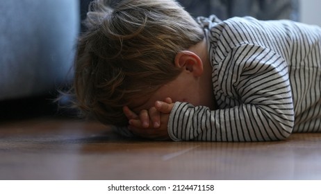 Child Crying On Floor Having Tantrum Little Boy Cries