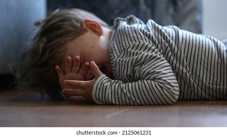 Child Crying On Floor Having Tantrum Little Boy Cries