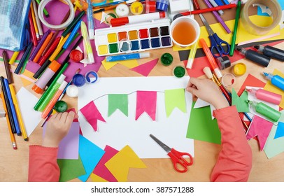 Child cut applique top view. Artwork workplace with creative accessories. Flat lay art tools for painting. - Shutterstock ID 387571288