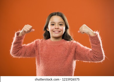 Child cute girl show biceps gesture of power and strength. Feel so powerful. Girls rules concept. Upbringing advices for girls. Strong and powerful. Golden rules for raising mentally strong kids.
