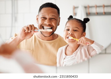 Child, dad and brushing teeth in a family home bathroom for dental health and wellness in a mirror. Face of african man and girl kid learning to clean mouth with toothbrush and smile for oral hygiene - Shutterstock ID 2311850433