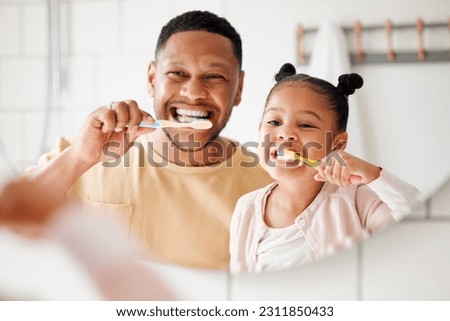 Child, dad and brushing teeth in a family home bathroom for dental health and wellness in a mirror. Face of african man and girl kid learning to clean mouth with toothbrush and smile for oral hygiene