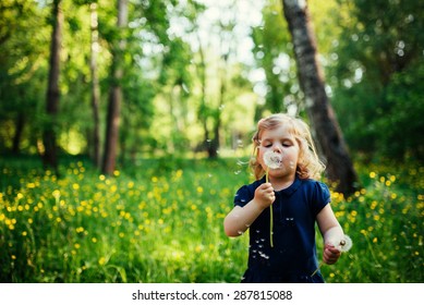 Child With Dandelion