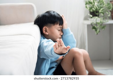 A child with deeply hidden emotions refusing to take a helping hand, showing fear, emotional withdrawal, and signs of unresolved childhood stress. Bullying concept
