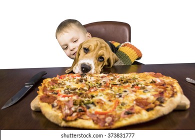 A Child And A Dog Eating Pizza