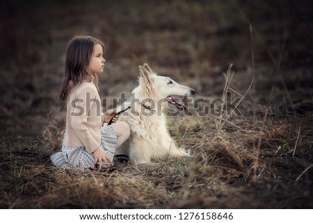 Similar – Foto Bild Mädchen mit Welpe am See