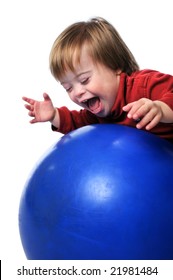 Child With Down Syndrome Smiling And Playing With Ball Isolated Over A White Background.