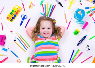 Child With Draw And Paint Supplies. Kids Happy To Go Back To School. Preschool Kid Learning And Studying. Creative Children At Kindergarten. Office Supply Objects Collection.