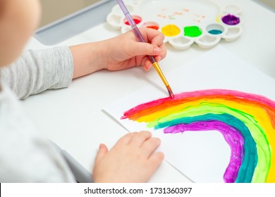 Child is drawing happy