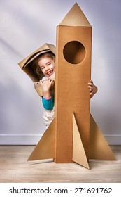 Child Is Dressed In An Astronaut Costume