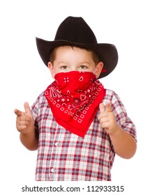 Child dressed up as cowboy playing isolated on white
