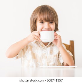 Child Drinking Tea