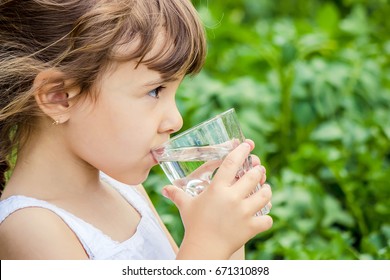 Child Drinks Water.