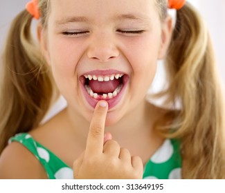 The Child Dropped The First Milk Tooth