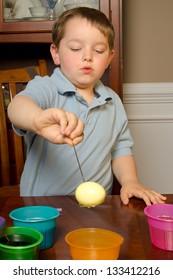 Child Dying Eggs For Easter