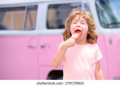 Child Eating Ice Cream. Kid With Frozen Dessert In Hand. Delicious Icecream