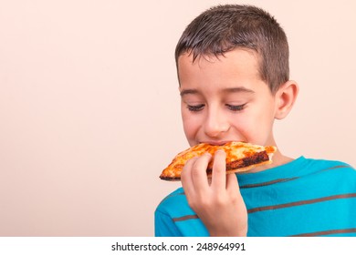 Child Eating Pizza