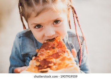 Child Eating Pizza. Fastfood For Kids. Junkfood Addiction. Italian Cuisine. Children Food. Childhood Obesity. Tasty Food For Kid