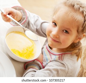 Child Eating Soup At Home. Little Girl Have A Dinner