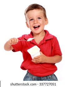 child eating a yoghurt