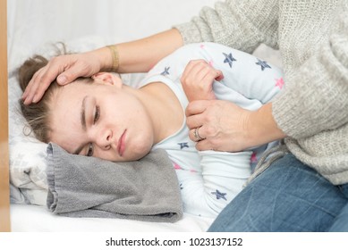 A child with epilepsy during a seizure - Shutterstock ID 1023137152
