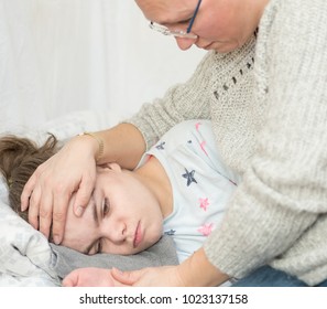 A child with epilepsy during a seizure - Shutterstock ID 1023137158